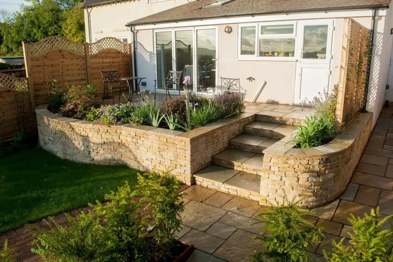 Andoversford countryside garden with dry-stone walling