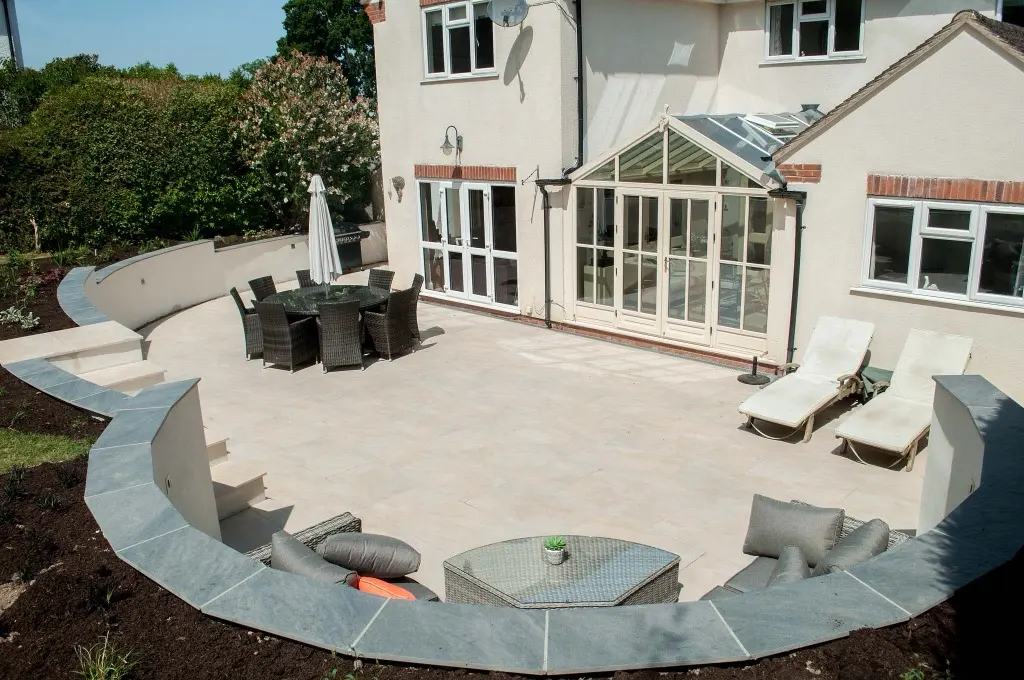 Sloping hillside garden landscaping in Gloucestershire