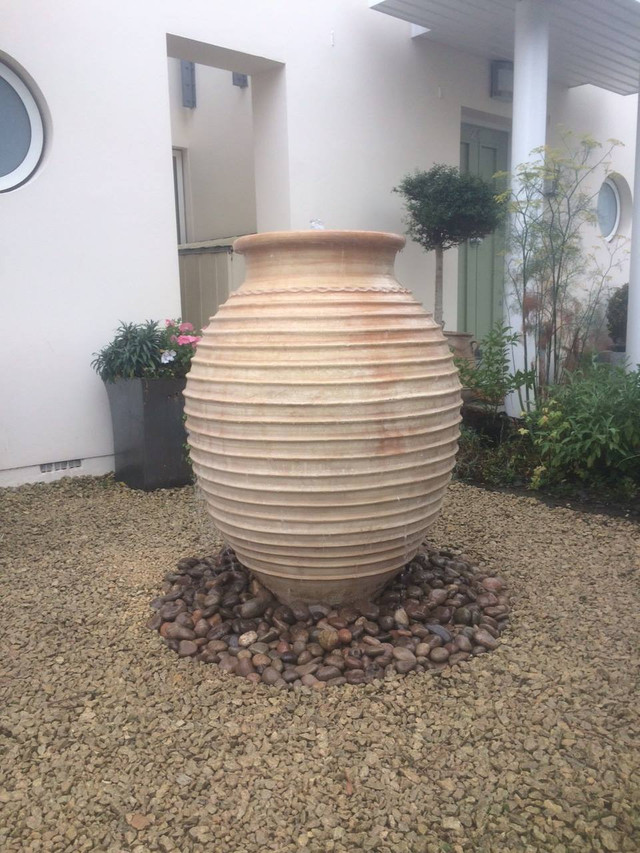 install a garden water feature beehive